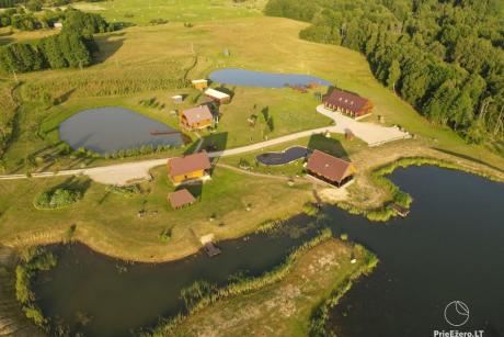 Birutės sodyba Utenos raj. poilsiui ir šventėms: nameliai, banketų salės, pirtis, kubilas